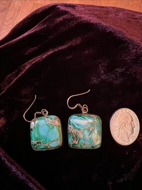 Turquoise stones set in sterling silver pierced earrings